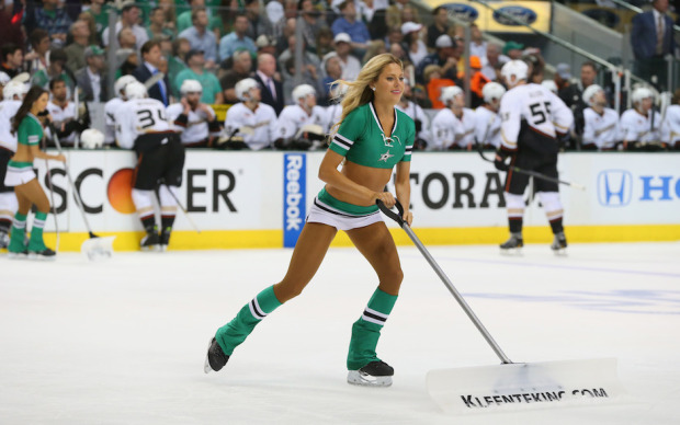 DALLAS, TX - APRIL 23:  A Dallas Stars ice girl cleans the ice in the second period during Game Four of the First Round of the 2014 NHL Stanley Cup Playoffs at American Airlines Center on April 23, 2014 in Dallas, Texas.